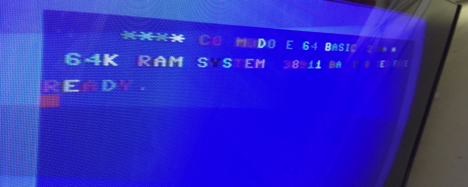 Commodore 64 assy no. 250407 Rev. B repair log with a broken PLA chip at U17