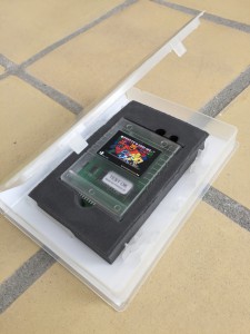 EasyFlash game cartridge with Ghost 'n Goblins game presented in a Universal Game case