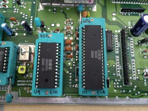 Commodore 64 Zero Insertion Force (ZIF) socket mod. C64 Assy 250469 board modified with ZIF sockets for easy IC chip testing. SID 8580 and CIA 6526 chips.