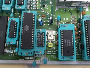 Commodore 64 Zero Insertion Force (ZIF) socket mod. C64 Assy 250469 board modified with ZIF sockets for easy IC chip testing. SID 8580 and VIC-II 8569chips.