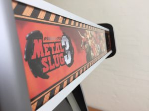 Marquee graphic's on the Metal Slug arcade machine