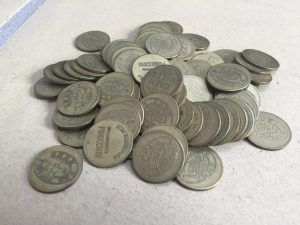 Arcade tokens for the Metal Slug arcade machine. breadbox64.com