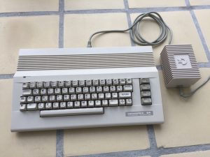 Commodore 64 modded with a Raspberry Pi 3 model B. The machine runs RetroPie with emulators for the Commodore 64. Read about the mod on breadbox64.com.