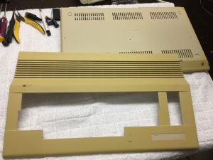 FIlling the holes in a Commodore 64. Case modding on breadbox64.com