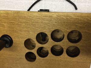 Fightstick made from a solid piece of oak wood. Internal wires. breadbox64.com