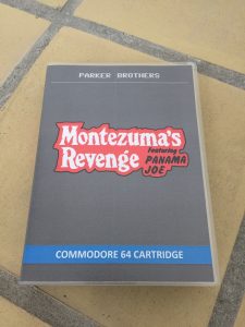 Commodore 64 Montezuma's revenge on cartidge and a Magic Cart.